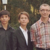 Нил Братцев