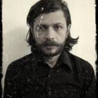 Роман Кость